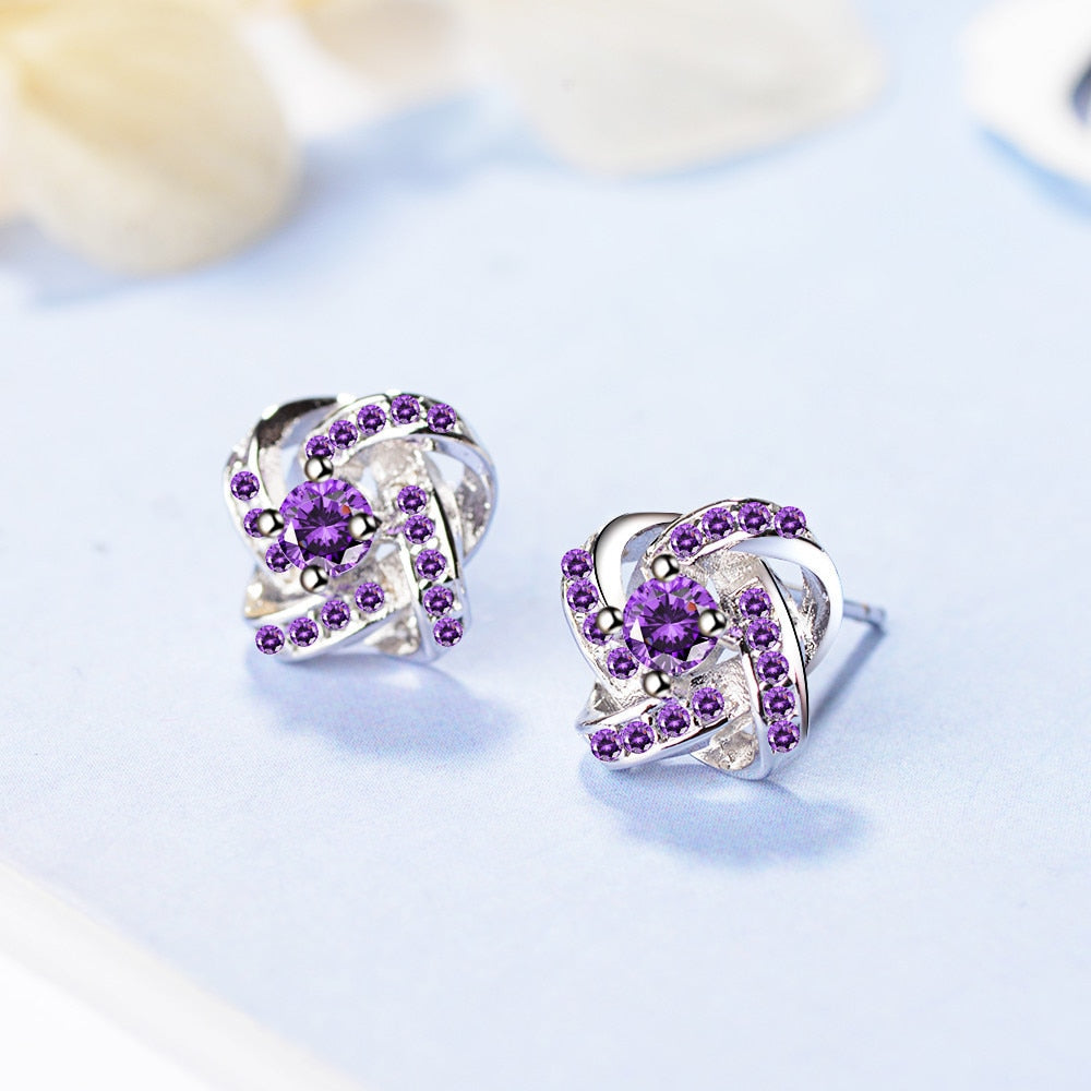 Brinco de Prata Entrelaçado com Zircônias